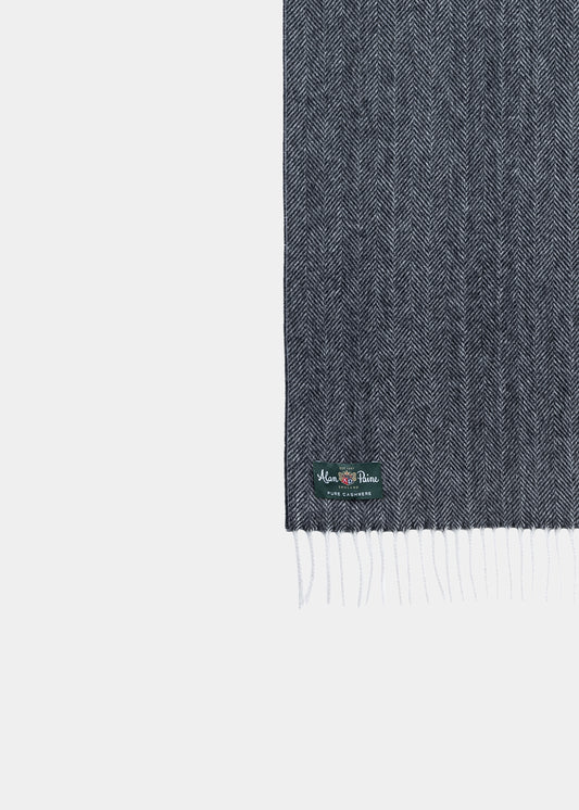 Kinross Cashmere Herringbone Scarf in charcoal, with fringed ends and a green label, shown on a white background.