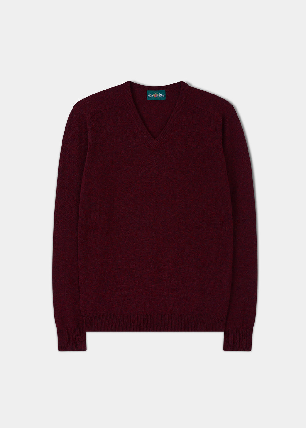 Kilsyth Lambswool Vee Neck Jumper in Red Velvet, regular fit, long sleeves, laid flat on a white background.
