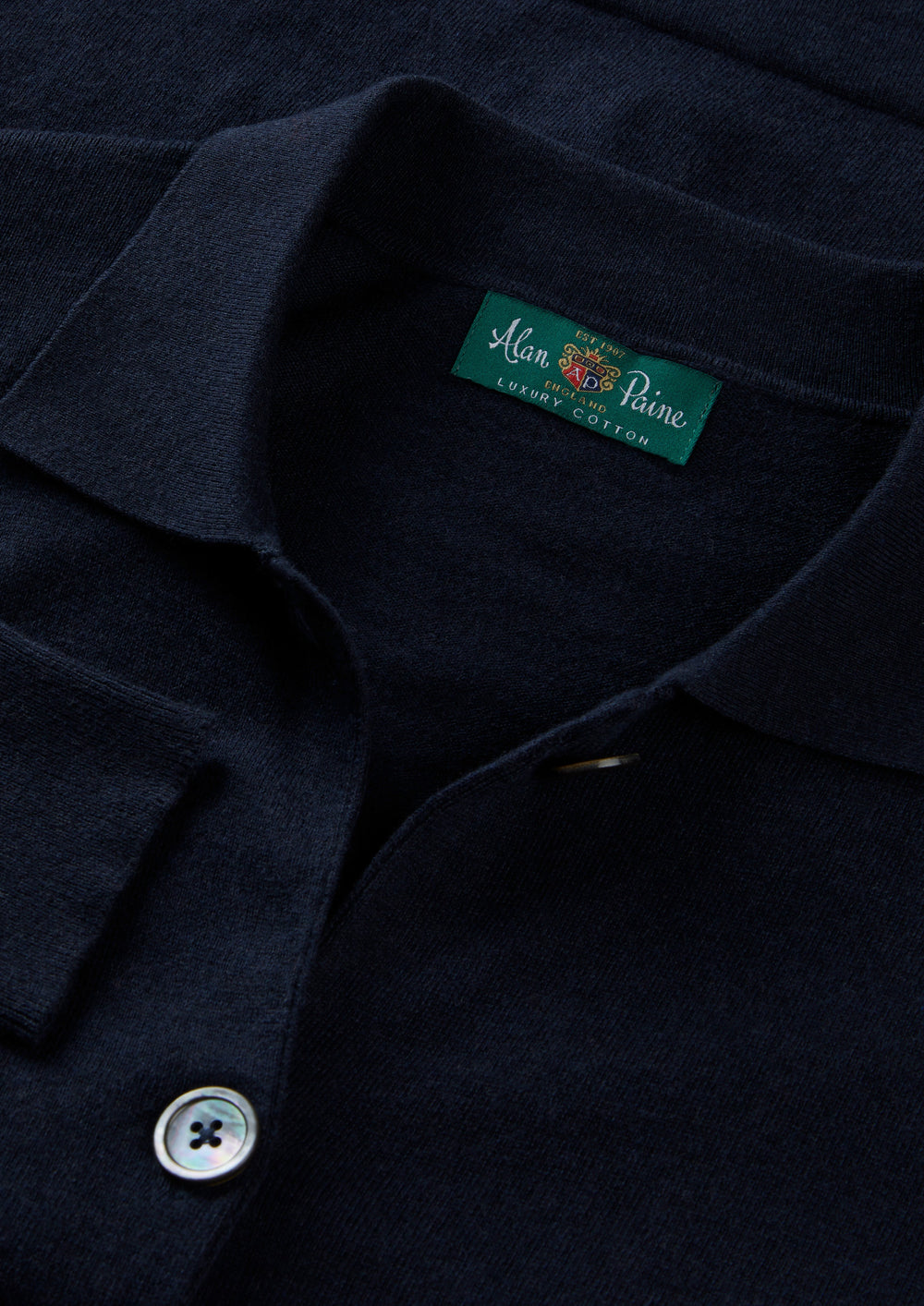 Womens Cardigan in dark navy cotton cashmere knit, with buttoned neckline and stitched label