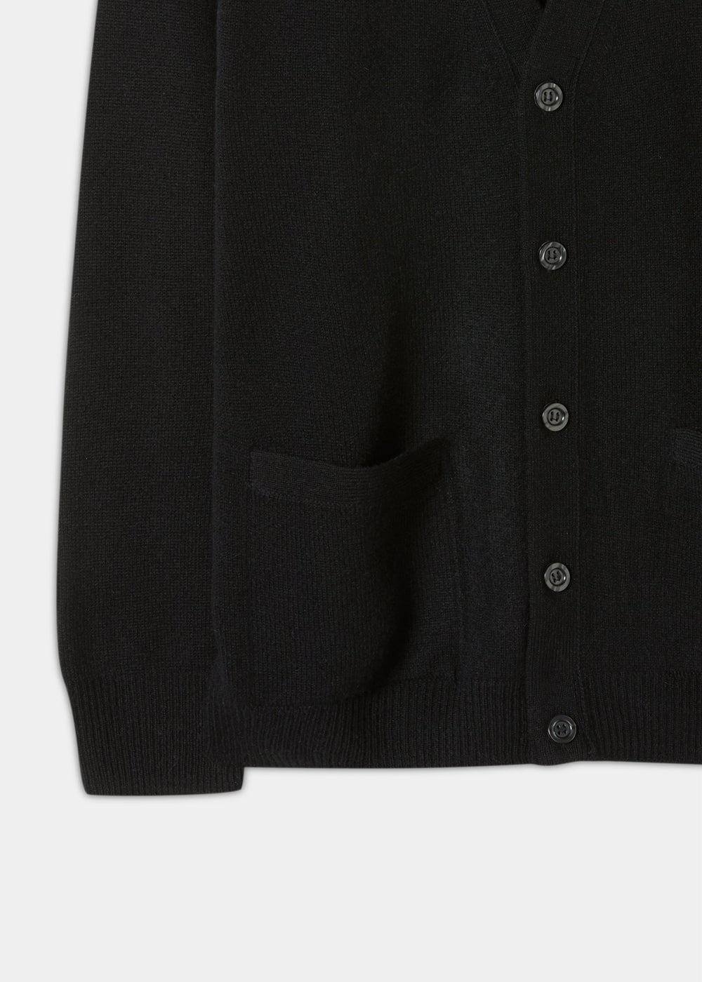 Cornwall Lambswool V-Neck Cardigan in black, classic fit, with two front pockets; midsection to hem shown.