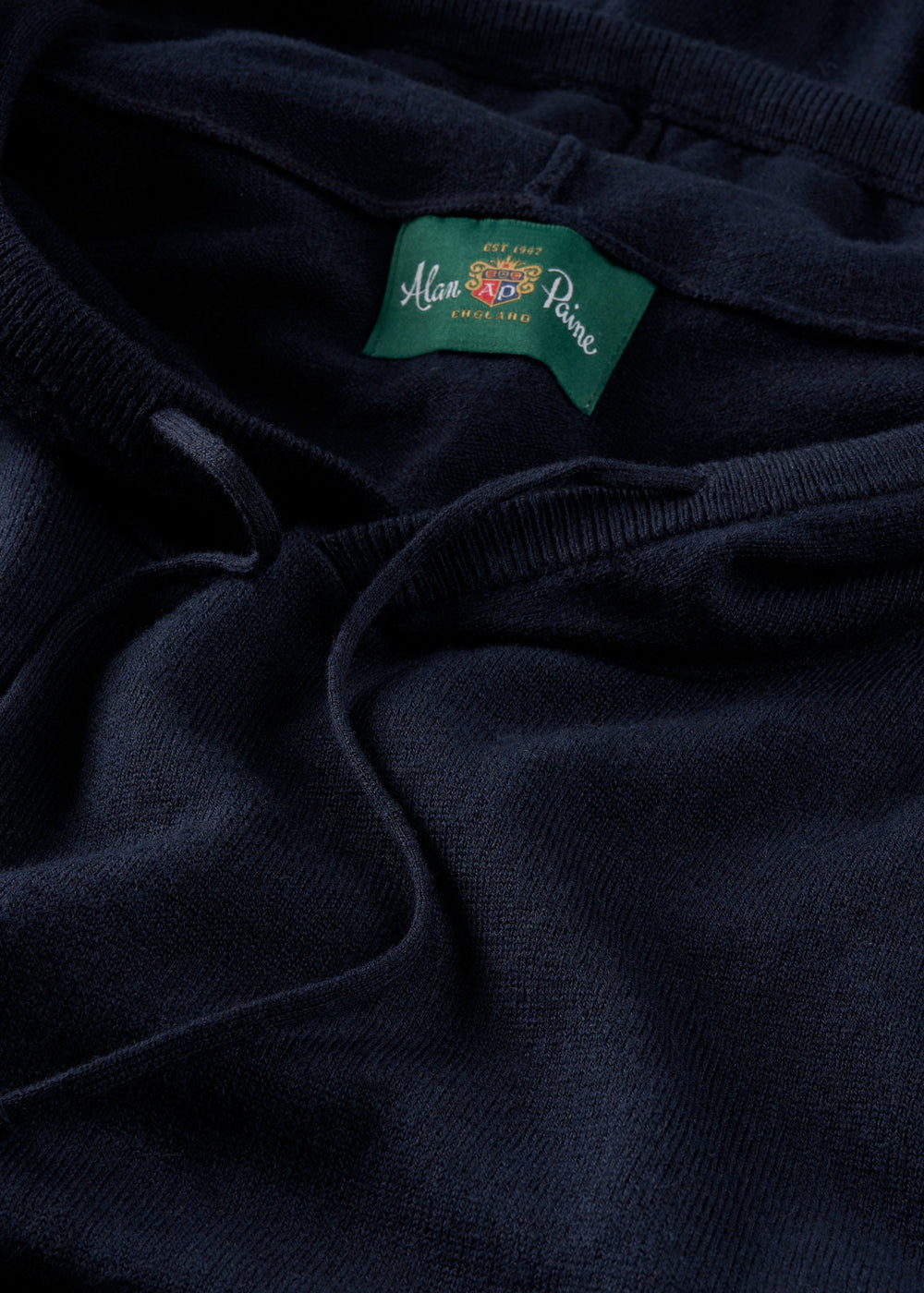 Close-up of the Gaisby Cotton Merino Hoodie in Dark Navy, Regular Fit, featuring the neckline brand label.