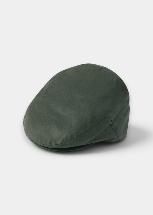 Alan Paine Salcombe men's olive green waxed cotton flat cap with a water-repellent finish for outdoor wear.