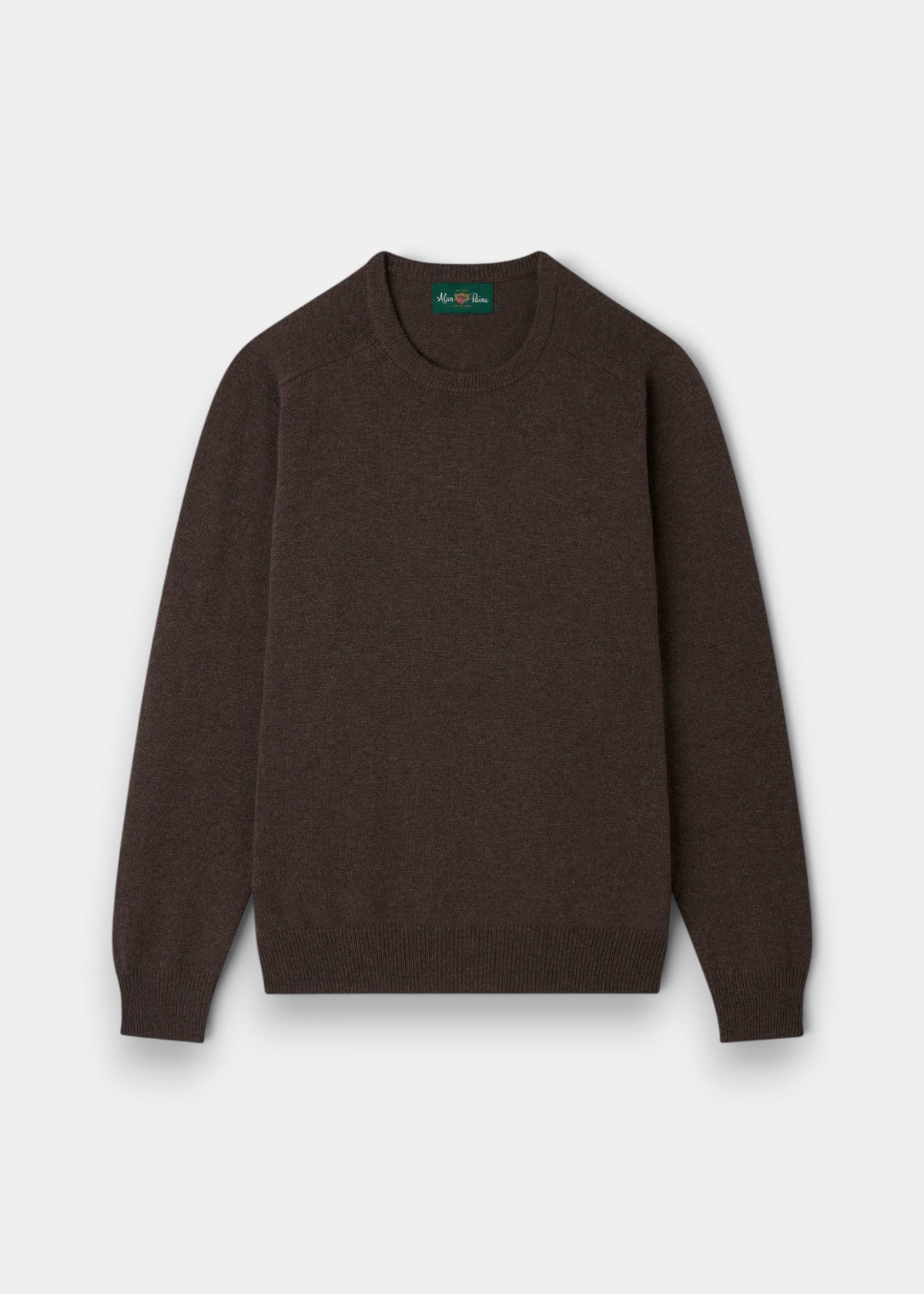Dorset Lambswool Crew Neck Jumper in Mocha, classic fit, long-sleeved, is laid flat on a white background.