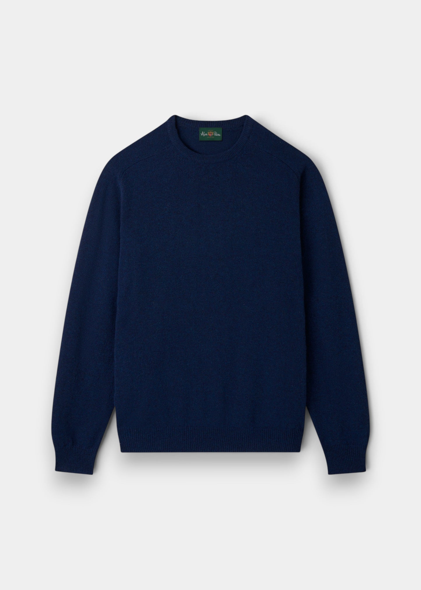 Alan Paine Dorset men's crew neck jumper in indigo blue, crafted from soft lambswool with a classic saddle shoulder.