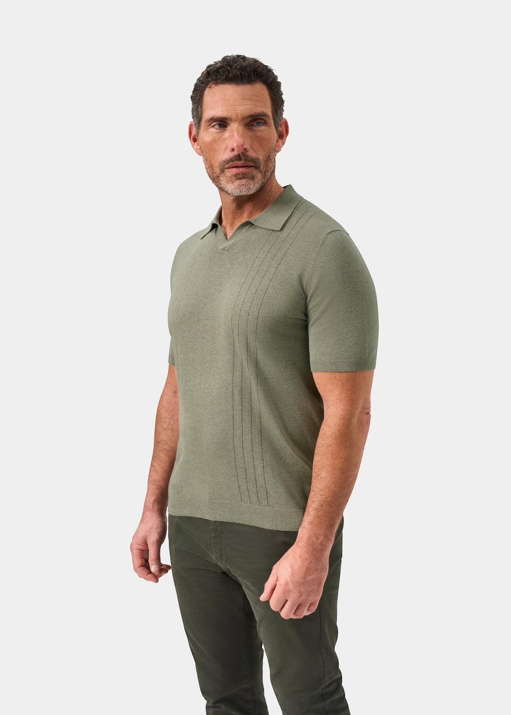 Alan Paine Shipford men's short sleeve polo shirt in landscape green wool-linen-silk blend with open collar detail.